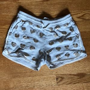 Heather gray shorts with gold glitter hearts